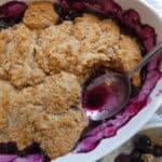 top down view of healthier blueberry cobbler with spoon