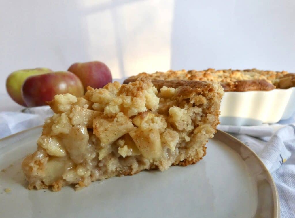 slice of german streusel apple pie