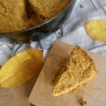 overhead of slice of pumpkin pecan skillet cornbread