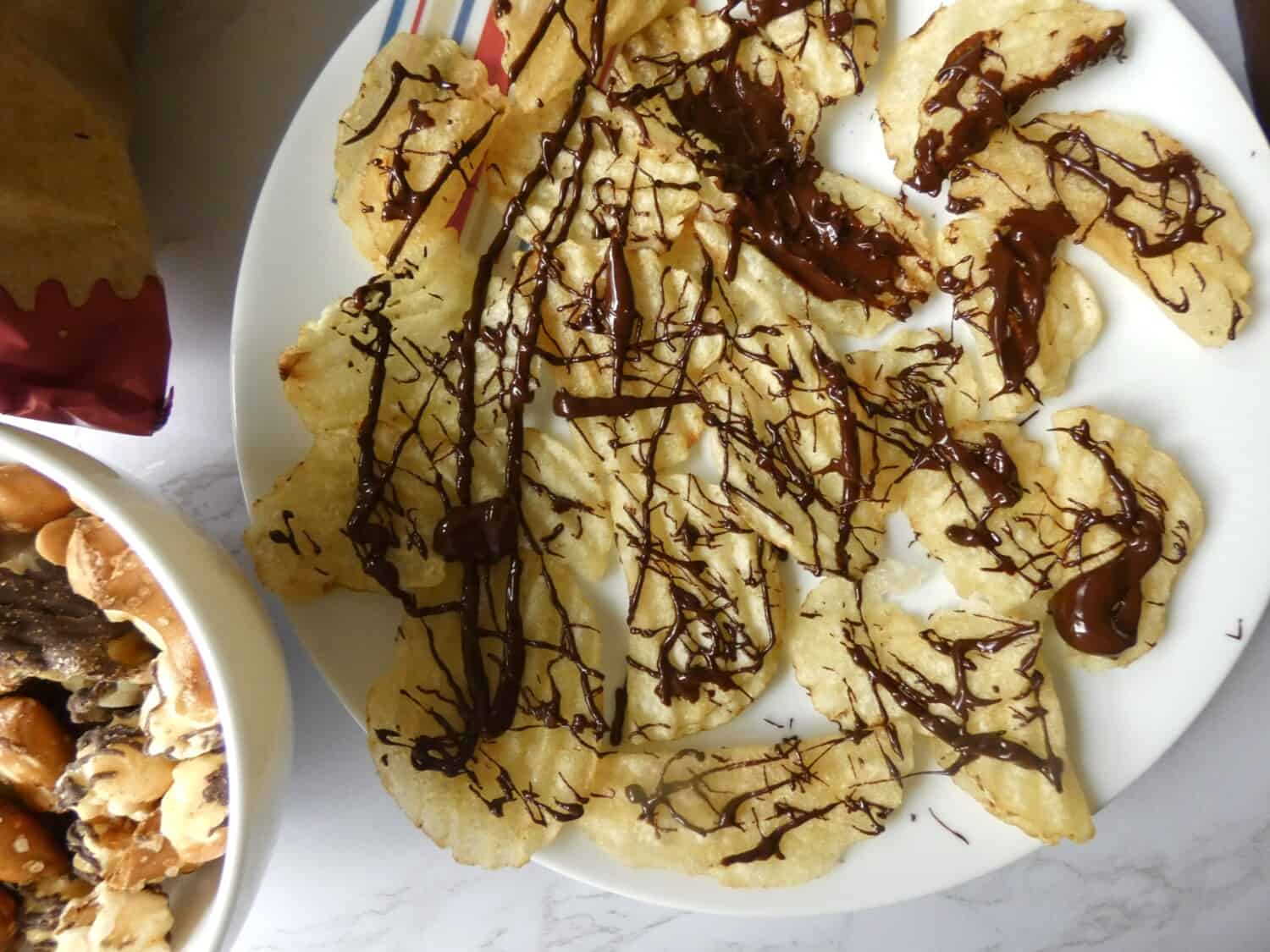 plate of chocolate drizzled chips