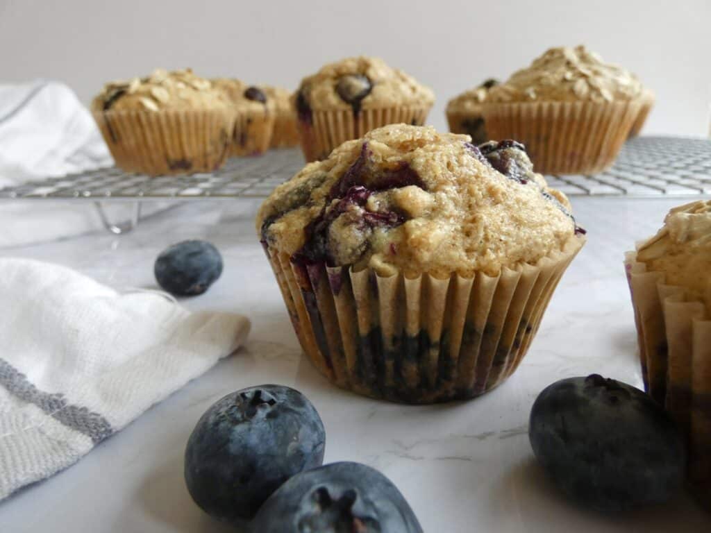 healthier maple blueberry oat muffin with blueberries