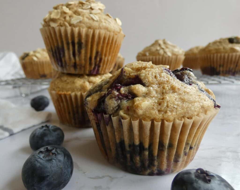 stack of healthier maple blueberry oat muffins