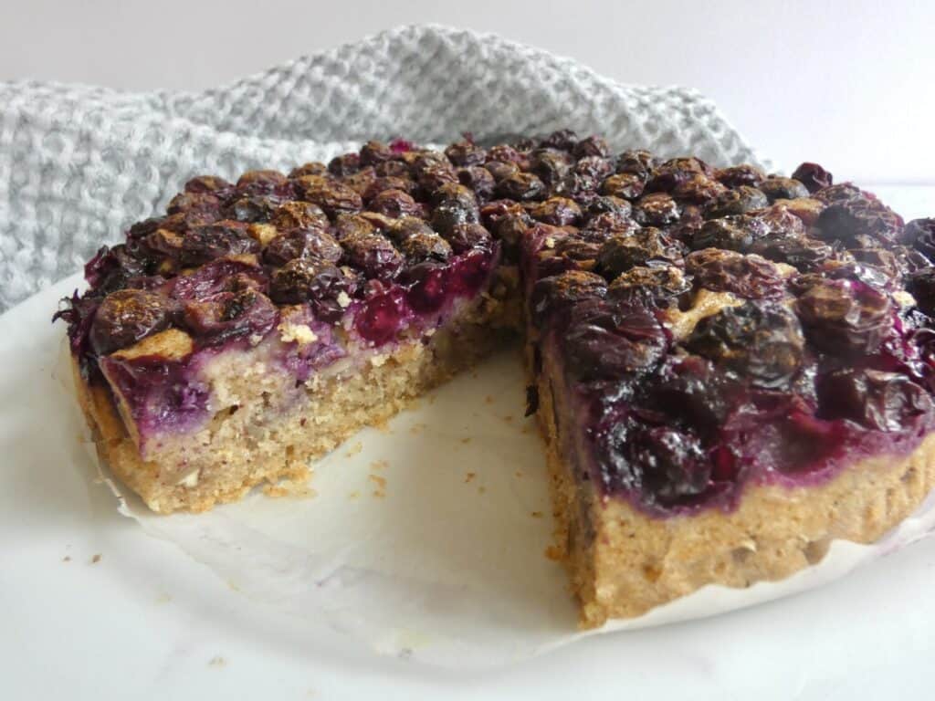 Healthy One-Bowl Berry Cake with missing slice