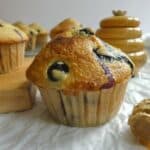 blueberry cornbread muffin with honey dipper