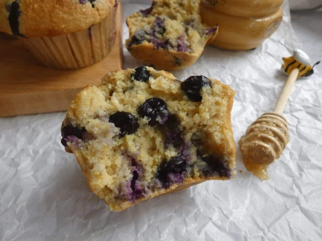 half of a blueberry cornbread muffin