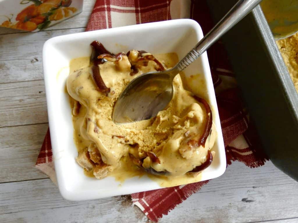 maple pumpkin pecan ice cream with spoon in bowl