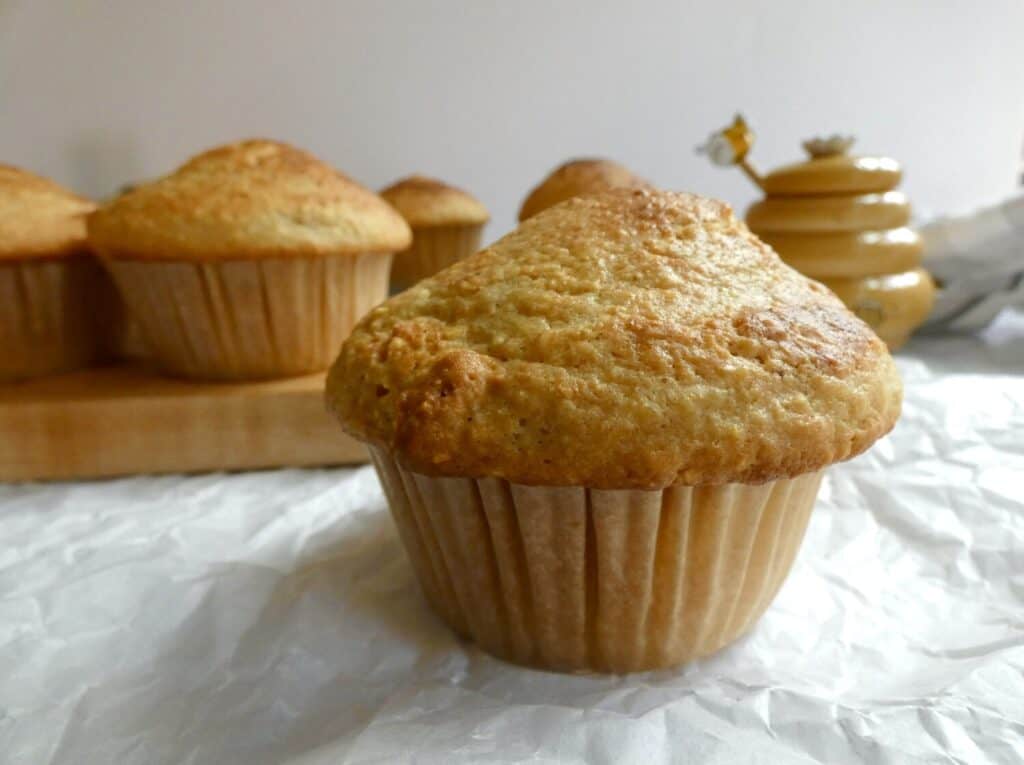 bakery style cornbread muffin on parchment paper