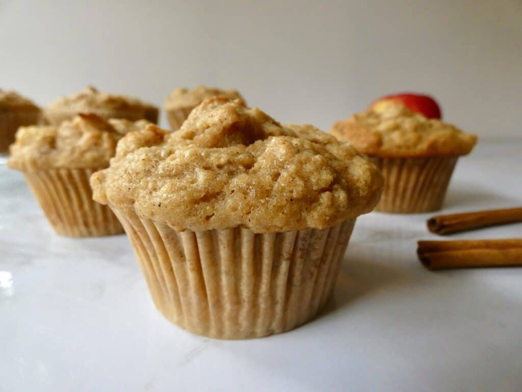 healthy apple muffins on marble counter