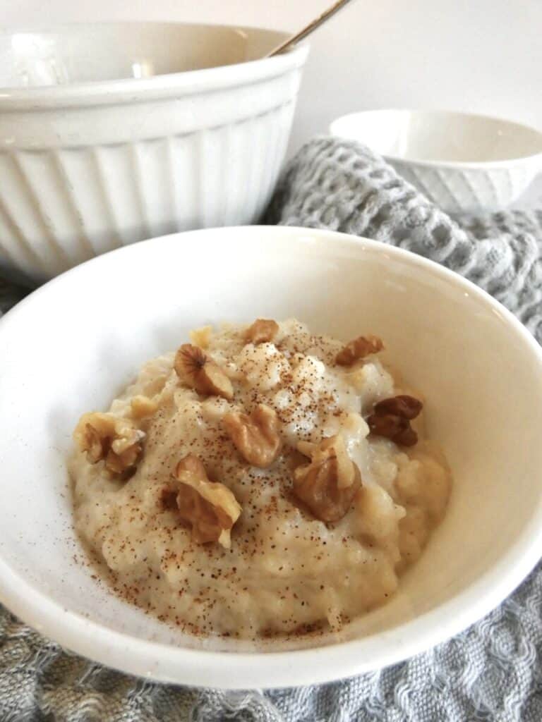 creamy Chai spice rice pudding vertical image