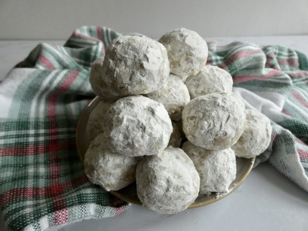 plate of healthier Russian tea cakes on a red and green towel