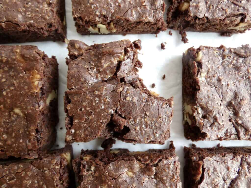 Ultimate Fudgy Brownies on parchment paper