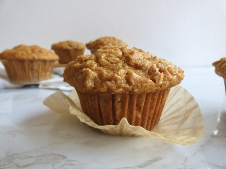 healthy carrot cake muffin on muffin liner