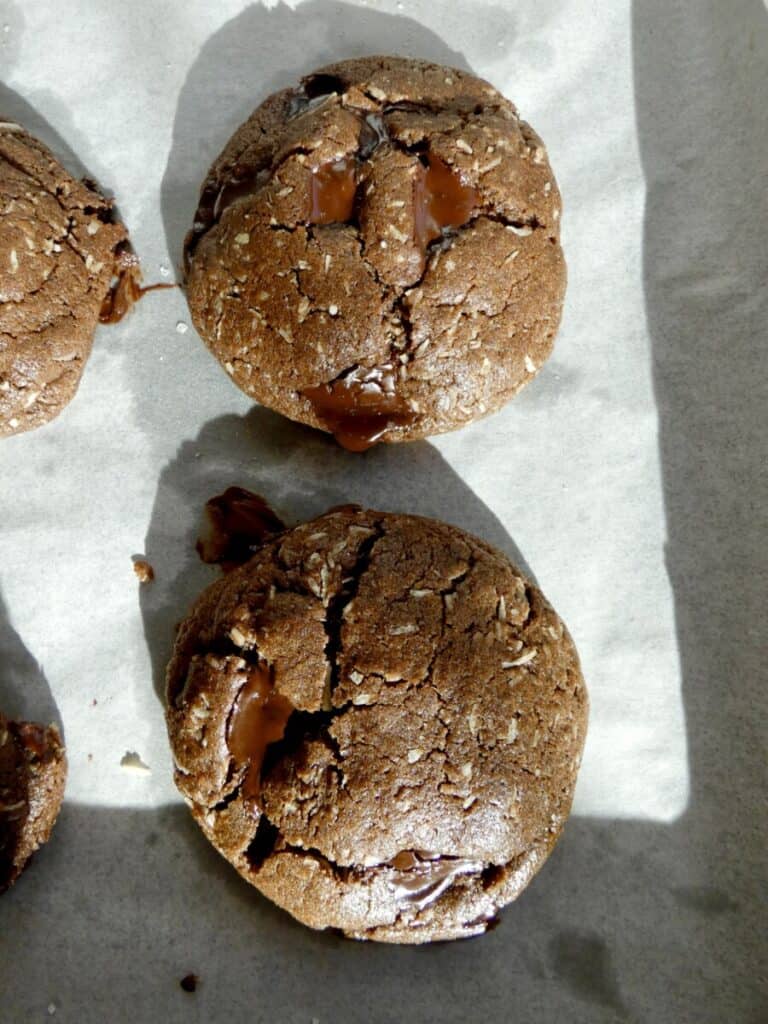 two secret ingredient fudgy double chocolate cookies on baking sheet