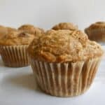 healthy whole wheat banana muffins on marble counter