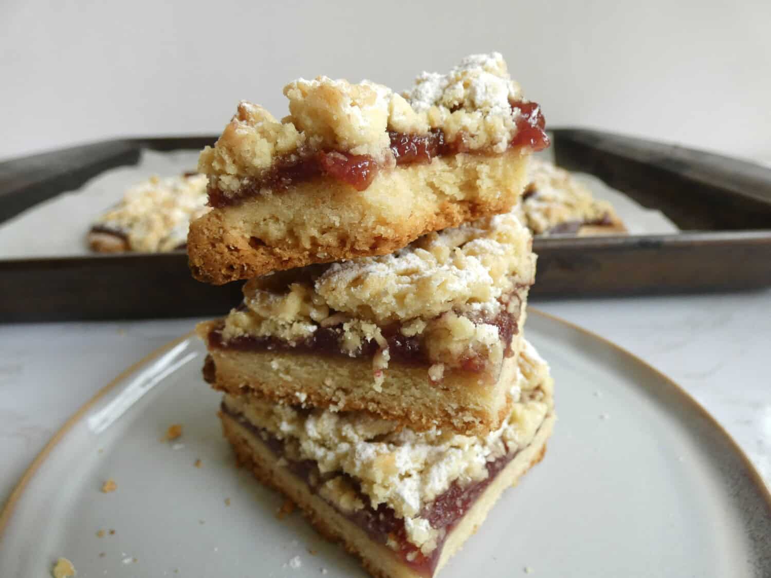 stack of raspberry crumb bars