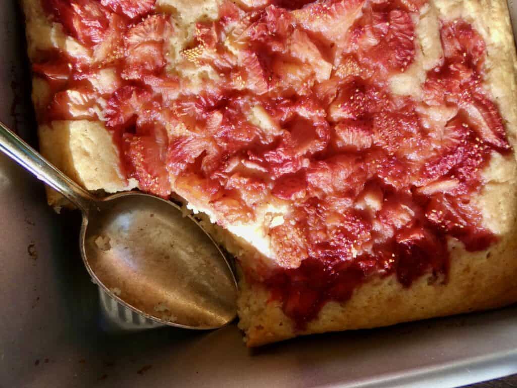 Easy Jammy Strawberry Cake with spoon in pan