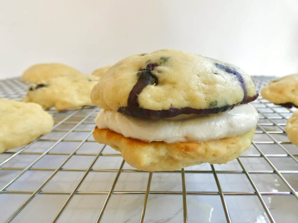 healthier blueberry whoopie pie on a wire rack