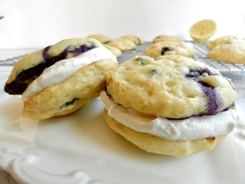 two healthier blueberry whoopie pies on a plate