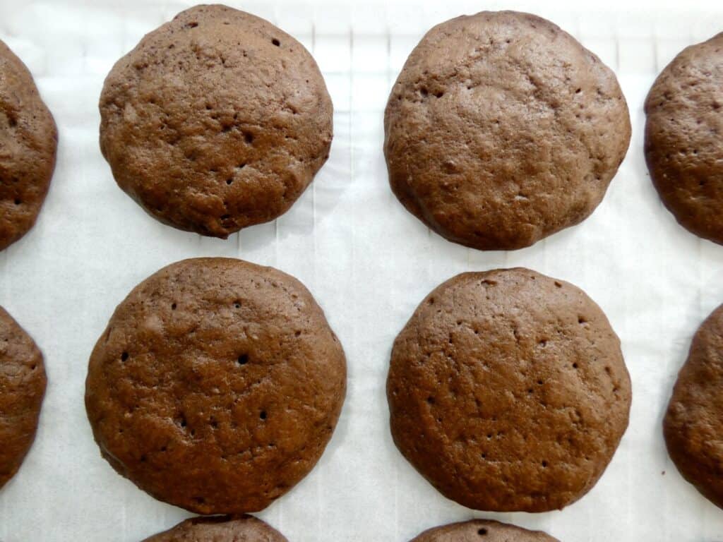 top down image of healthier chocolate whoopie pies on a cooling rack