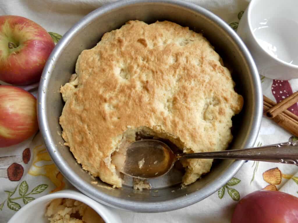 Eve's Pudding with a missing scoop from pan