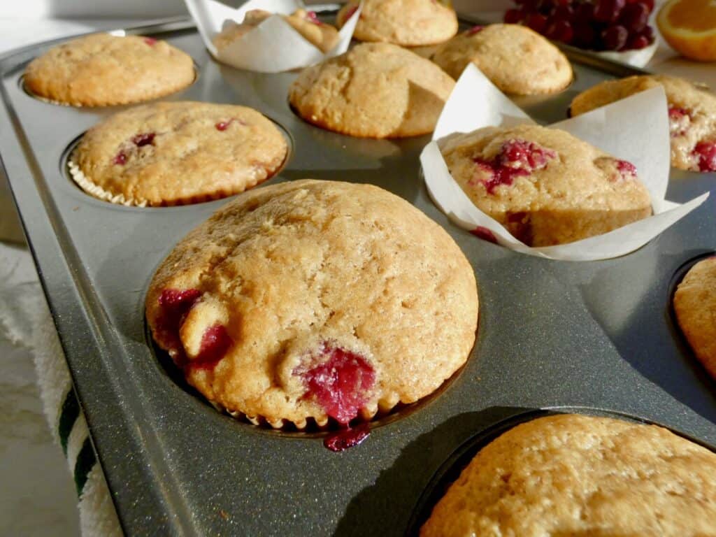 Cranberry Orange Muffins in muffin pan