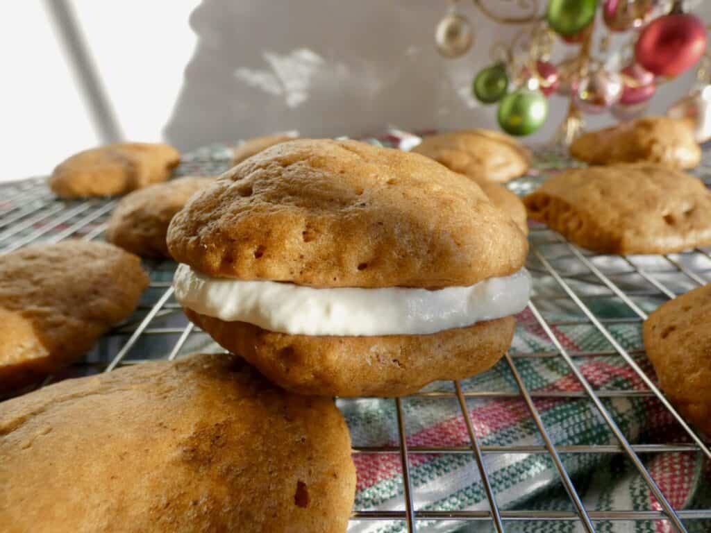 close up of gingerbread whoopie pie on wire rack